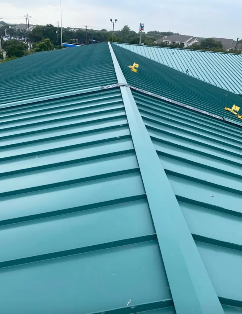 Green commercial metal roof ridge and valley for Metal Roof Repair in Winterset