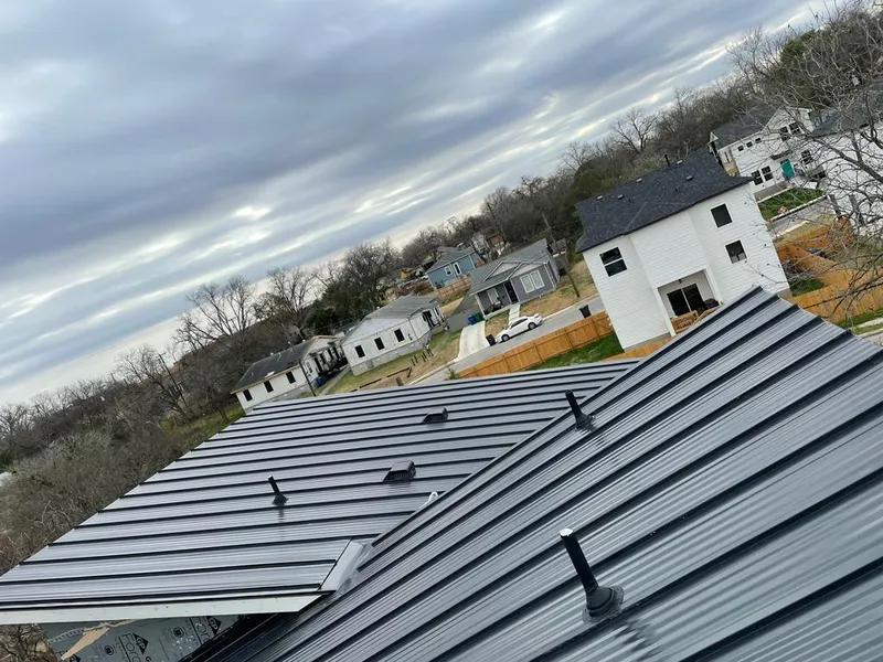 Standing seam metal roof panels with vents for Skylight Repair in Winterset